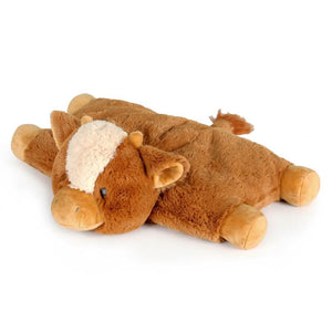 Brown plush toy cow lying on a white background.