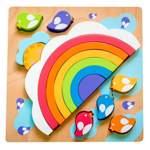 A colorful wooden children's puzzle board featuring a rainbow and bird pieces on a light wood background.